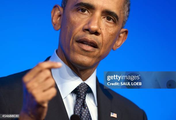 President Barack Obama speaks at a press conference on the second day of the NATO 2014 Summit at the Celtic Manor Resort in Newport, South Wales, on...