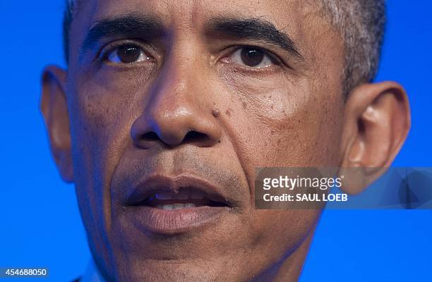 President Barack Obama speaks at a press conference on the second day of the NATO 2014 Summit at the Celtic Manor Resort in Newport, South Wales, on...