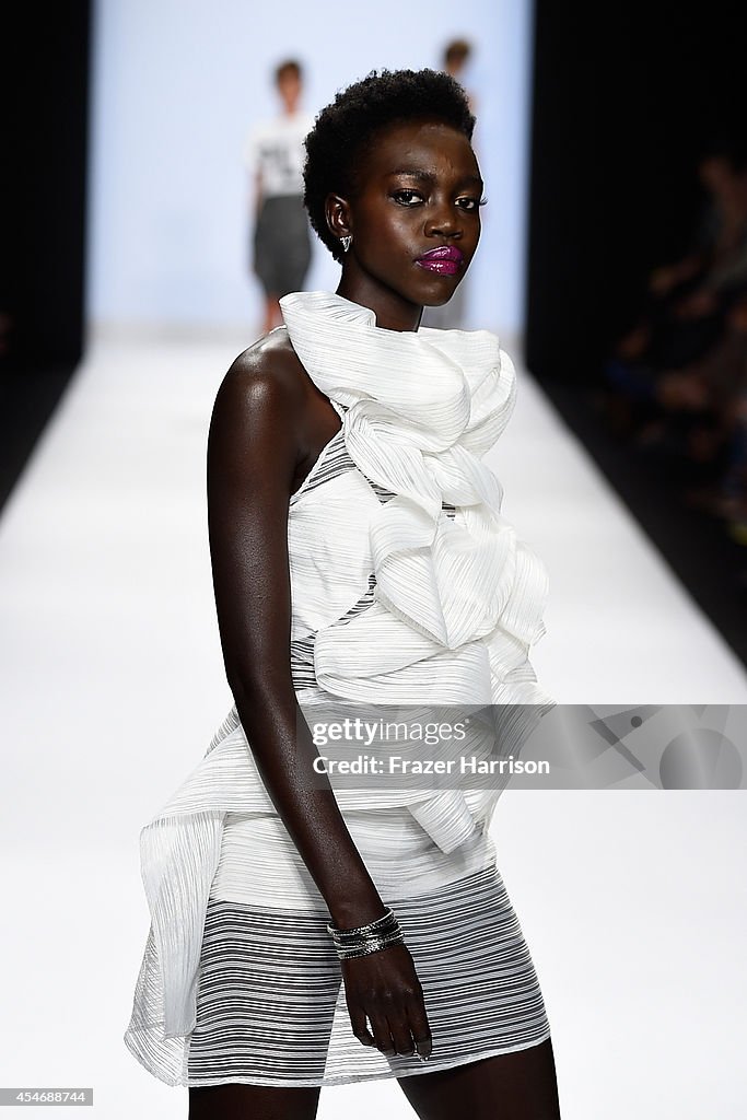 A model walks the runway at the Project Runway fashion show during ...