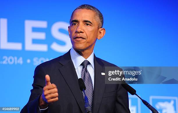 President Barack Obama speaks during a press conference on day two of the 2014 NATO Summit at the Celtic Manor Resort in Newport, Wales, on September...