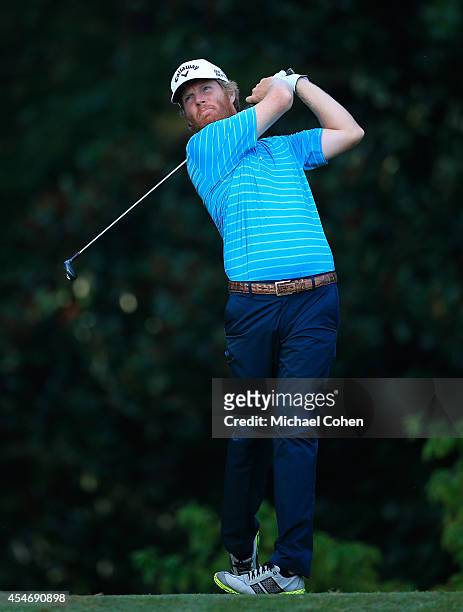Derek Fathauer hits his drive on the 11th hole during the second round of the Chiquita Classic held at River Run Country Club on September 5, 2014 in...