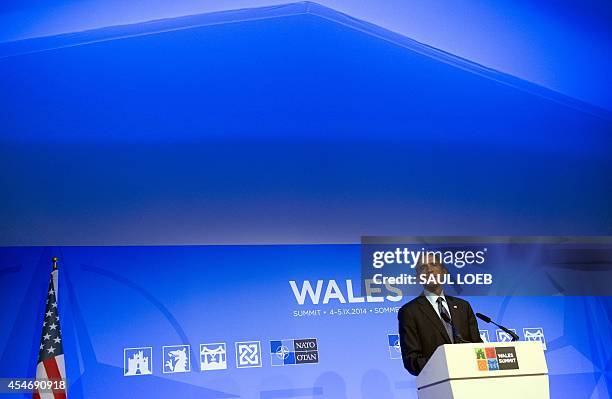 President Barack Obama answers questions from the media during a press conference on the second day of the NATO 2014 Summit at the Celtic Manor...