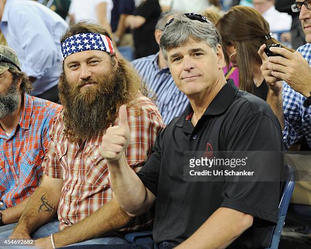 Willie Robertson and Sean Hannity attend day 11 of the 2014 US Open at USTA Billie Jean King National Tennis Center on September 4, 2014 in New York...