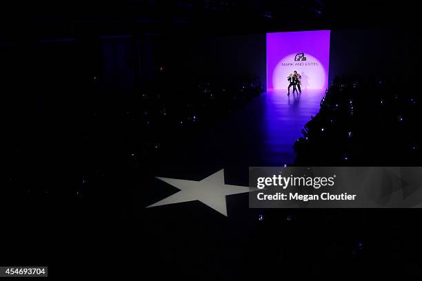 Fashion designers Estel Day and Mark Tango perform on the runway at the Mark And Estel fashion show during Mercedes-Benz Fashion Week Spring 2015 at...