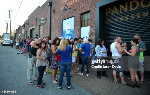 Fans gather outside Pandora Presents Trace Adkins sponsored by Marathon at Marathon Music Works on September 4, 2014 in Nashville, Tennessee.