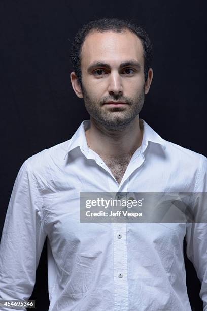 Actor Khalid Abdalla of "The Narrow Frame of Midnight" poses for a portrait during the 2014 Toronto International Film Festival on September 5, 2014...
