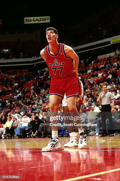 Gheorghe Muresan of the Washington Bullets boxes out against the Atlanta Hawks circa 1994 at the OMNI in Atlanta, Georgia. NOTE TO USER: User...
