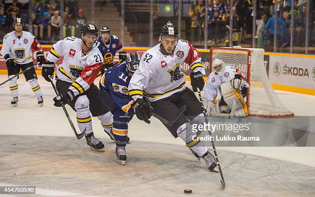 Colby Cohen of Nottingham Panthers takes the puck from Aaron Gagnon of Lukko Rauma during the Champions Hockey League group stage game between Lukko...