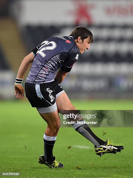 Ospreys player Sam Davies kicks at goal during the Guinness Pro 12 match between Ospreys and Benetton Rugby Treviso at Liberty Stadium on September...