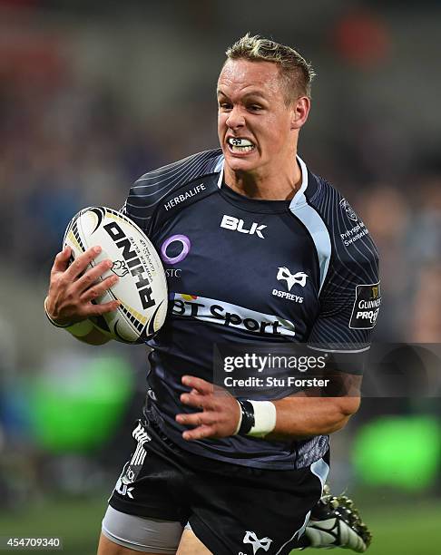 Ospreys player Hanno Dirksen on his way to scoring the final try during the Guinness Pro 12 match between Ospreys and Benetton Rugby Treviso at...