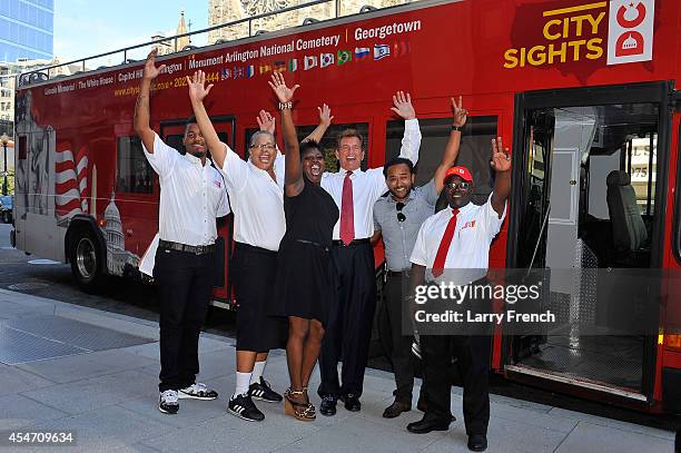 Two - Time Pro Bowler and Super Bowl XVII Winner Joe Theismann, , with CitySights DC staff, is honored by the Ride of Fame with his own bus and seat...