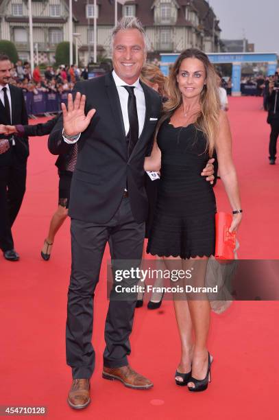 David Ginola and Coraline Ginola arrive at the opening ceremony of 40th Deauville American Film Festival on September 5, 2014 in Deauville, France.