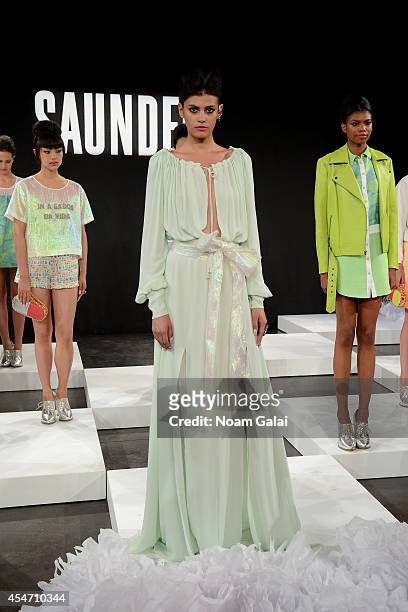 Model Alisar Ailabouni poses at the Saunder fashion show during Mercedes-Benz Fashion Week Spring 2015 at The Hub at The Hudson Hotel on September 5,...