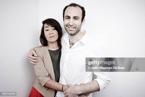 Actor Khalid Abdalla and director Tala Hadid are photographed for a Portrait Session at the 2014 Toronto Film Festival on September 5, 2014 in...