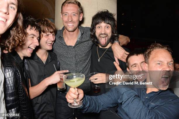 Jeff Wootton, Jay Sharrock, Peter Crouch, Sergio Pizzorno, Miles Kane and Stephen Graham attend the Soho House event to celebrate Kasabian's...