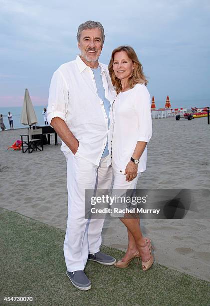 Brian Russell and Cheryl Ladd attend a private sunset reception at Minerva Beach celebrating Fight Night In Italy benefitting The Andrea Bocelli...