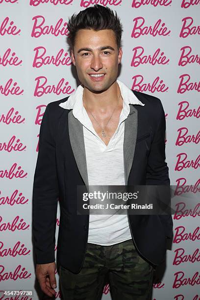 Model John Strand attends Barbie And CFDA Event on September 5, 2014 in New York City.