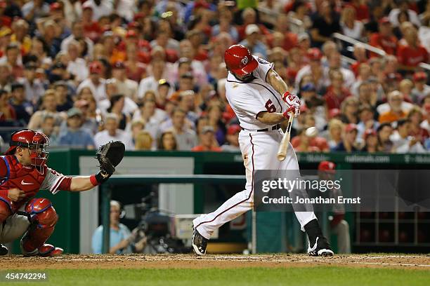 Anthony Rendon of the Washington Nationals hits a two-run double against the Philadelphia Phillies in the fifth inning of a 9-8 Phillies victory at...