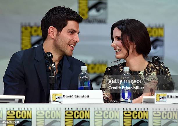 Actor David Giuntoli and actress Bitsie Tulloch attend the "Grimm" season four panel during Comic-Con International 2014 at the San Diego Convention...