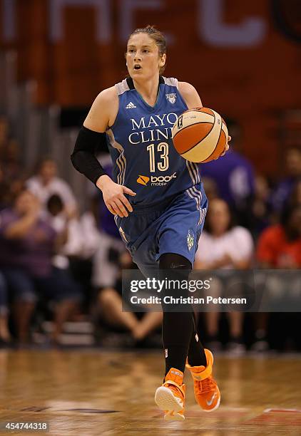 Lindsay Whalen of the Minnesota Lynx handles the ball during game three of the WNBA Western Conference Finals against the Phoenix Mercury at US...