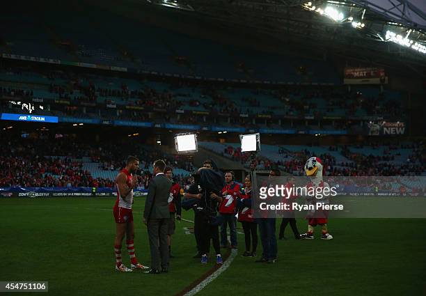 Lance Franklin of the Swans is interviewed by Andrew Welsh after the First Qualifying Final AFL match between the Sydney Swans and the Fremantle...