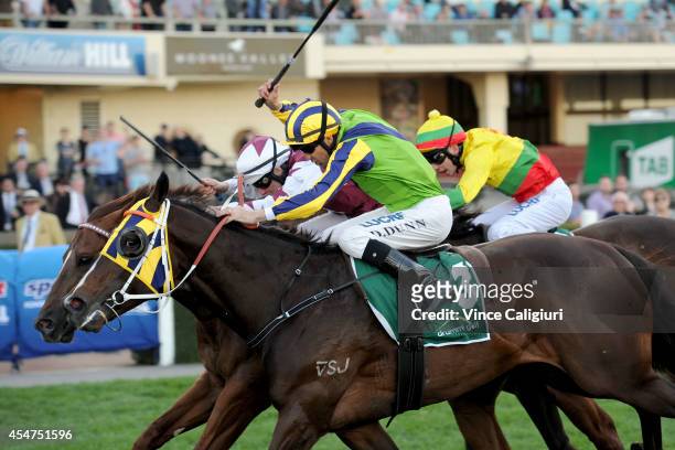 Dwayne Dunn riding Atlante defeats Damian Lane riding Trust in a Gust in Race 9 during Melbourne Racing at Moonee Valley Racecourse on September 6,...