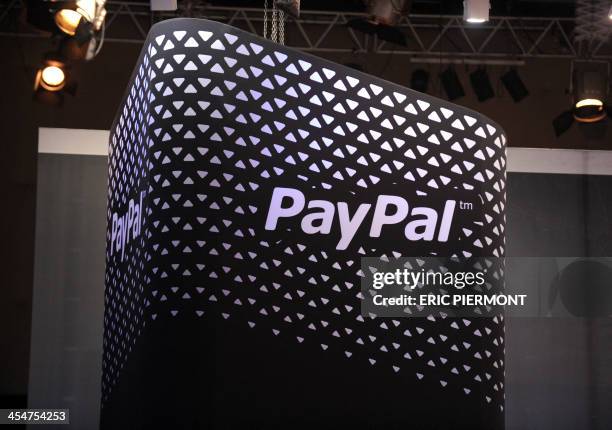 The logo of online payment company PayPal is pictured during LeWeb 2013 event in Saint-Denis near Paris on December 10, 2013. AFP PHOTO ERIC PIERMONT