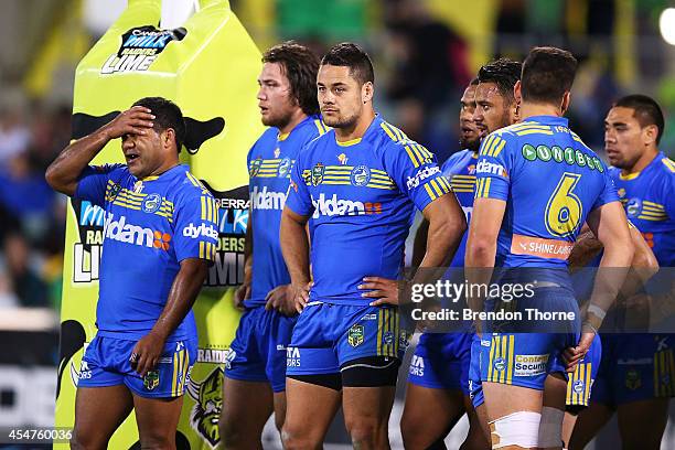 Eels players show their dejection after conceding a try during the round 26 NRL match between the Canberra Raiders and the Parramatta Eels at GIO...