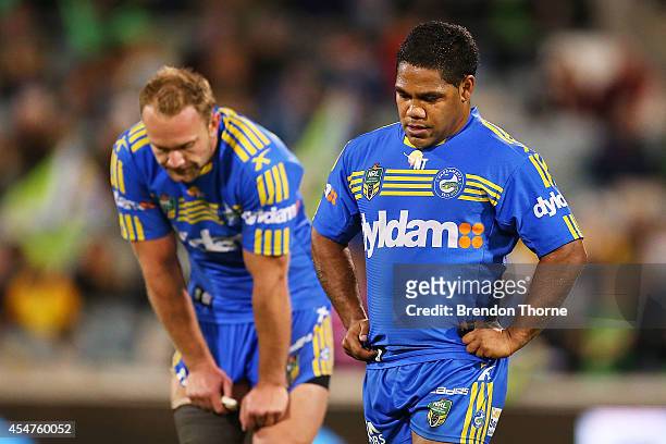 Chris Sandow and David Gower of the Eels shows his dejection at full time during the round 26 NRL match between the Canberra Raiders and the...
