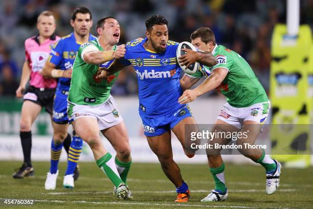 Ken Edwards of the Eels runs the ball during the round 26 NRL match between the Canberra Raiders and the Parramatta Eels at GIO Stadium on September...