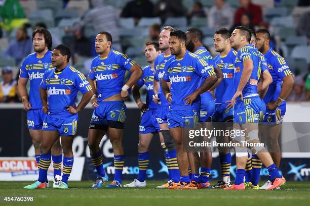 Eels players show their dejection after conceding a try during the round 26 NRL match between the Canberra Raiders and the Parramatta Eels at GIO...