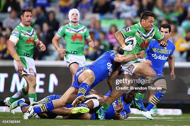 Josh Papalii of the Raiders runs the ball during the round 26 NRL match between the Canberra Raiders and the Parramatta Eels at GIO Stadium on...
