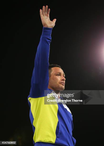 Brett White of the Raiders farewells fans on his lap of honour during the round 26 NRL match between the Canberra Raiders and the Parramatta Eels at...