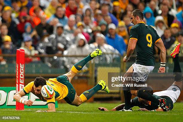 Adam Ashley-Cooper of the Wallabies dives for the line during The Rugby Championship match between the Australian Wallabies and the South African...