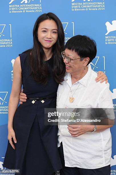 Director Ann Hui and actress Tang Wei attend 'The Golden Era' Photocall during the at Palazzo Del Casino on September 6, 2014 in Venice, Italy.