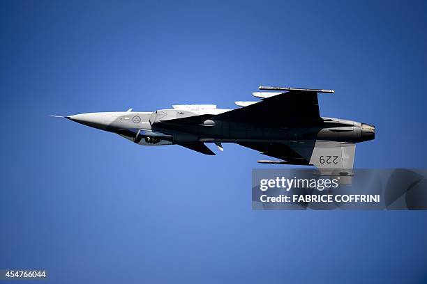 Saab JAS 39 Gripen fighter jet performs during the second week-end of the AIR14 air show on September 6, 2014 in Payerne, western Switzerland. The...