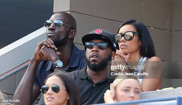 Kevin Garnett and his wife Brandi Garnett attend the women's semi finals during Day 12 of the 2014 US Open at USTA Billie Jean King National Tennis...