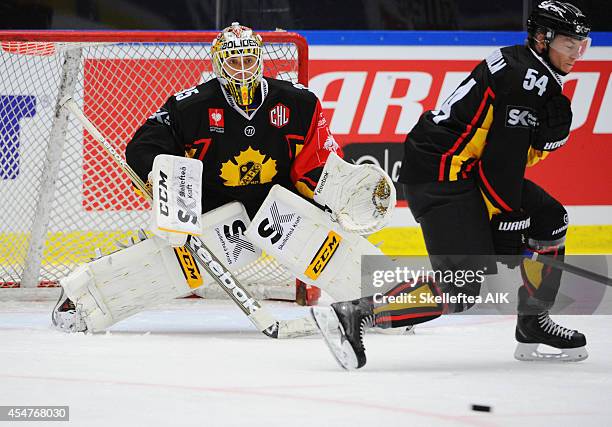 Skellefteå målvakt 35 Markus Svensson of Skelleftea see the puck coming during the Champions Hockey League group game bethween Skelleftea AIK and...