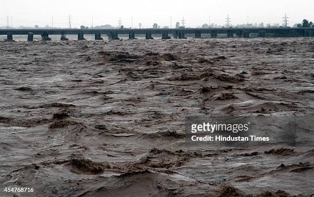 View of over flooded river Tawi during heavy rain and flash floods, on September 6, 2014 in Jammu, India. The region has been hit by its worst...