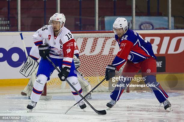 Mathias Seger ZSC of Zurich Lions and Filip Gunnarsson Valerenga Oslo during the Champions Hockey League group stage game between Valerenga Oslo and...