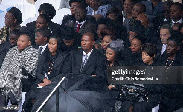 Members of the Mandela family, including grandson Mandla Mandela , attend the official memorial service for former South African President Nelson...