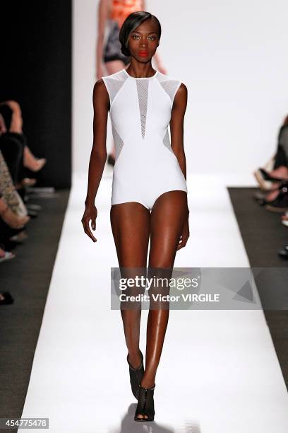 Model walks the runway at the Carmen Marc Valvo 25th Anniversary fashion show during Mercedes-Benz Fashion Week Spring 2015 at The Theatre at Lincoln...