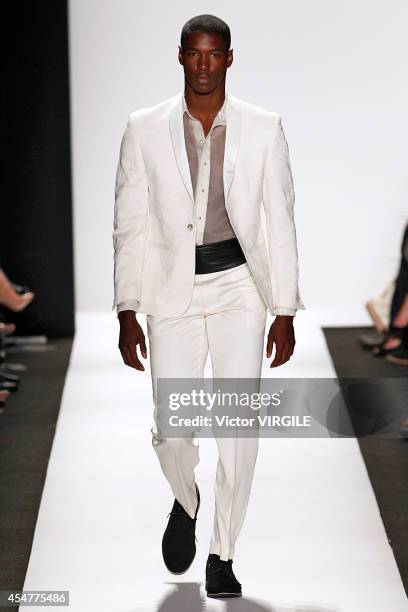 Model walks the runway at the Carmen Marc Valvo 25th Anniversary fashion show during Mercedes-Benz Fashion Week Spring 2015 at The Theatre at Lincoln...