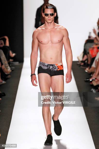 Model walks the runway at the Carmen Marc Valvo 25th Anniversary fashion show during Mercedes-Benz Fashion Week Spring 2015 at The Theatre at Lincoln...