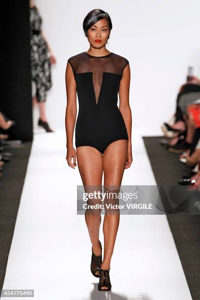 Model walks the runway at the Carmen Marc Valvo 25th Anniversary fashion show during Mercedes-Benz Fashion Week Spring 2015 at The Theatre at Lincoln...