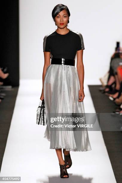 Model walks the runway at the Carmen Marc Valvo 25th Anniversary fashion show during Mercedes-Benz Fashion Week Spring 2015 at The Theatre at Lincoln...