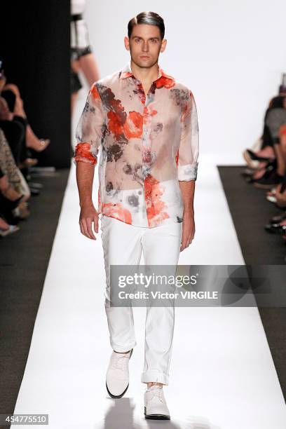 Model walks the runway at the Carmen Marc Valvo 25th Anniversary fashion show during Mercedes-Benz Fashion Week Spring 2015 at The Theatre at Lincoln...