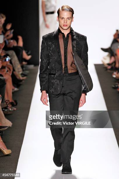 Model walks the runway at the Carmen Marc Valvo 25th Anniversary fashion show during Mercedes-Benz Fashion Week Spring 2015 at The Theatre at Lincoln...