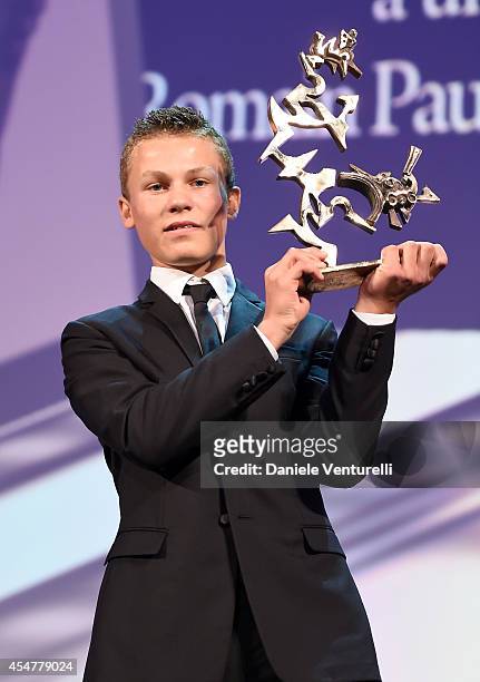 Actor Romain Paul poses onstage with the Marcello Mastroianni award for Best Young Actor he received for his role in the movie 'Le dernier coup de...