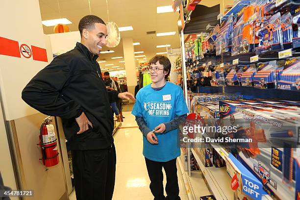 Kevin Martin of the Minnesota Timberwolves goes shopping for holiday gifts with kids who are up for adoption through the Minnesota Timberwolves...